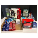 Assorted toiletries to include toothpaste, toothbrushes, body wash, cotton balls, and more. Tub is not included, see pictures or details.