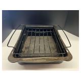 Cooks Tools roasting pan with roasting rack, see pictures for details.