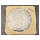 1884 Morgan Silver Dollar, see picture for details.