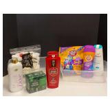 Assorted toiletries to include body wash, bar soap, cotton balls, and more. Tubs are not included, see pictures for details.