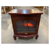 Cambridge electric heater with glass front, powers up, see pictures for details.