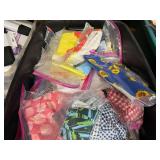 Large assortment of fabric remnants, see pictures for details.