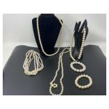 Ladies fashion faux pearl necklaces and bracelets, see pictures for details.