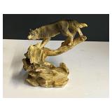 Wolf sculpture, appears to have a place for a small candle, see pictures for details.