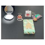 Bottle openers, keychains, and ladies compact. See pictures for details.