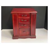 Jewelry box, has three drawers, top opens, and has two side doors for necklaces, see pictures for details.