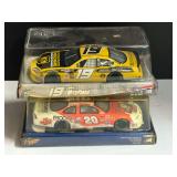 #19 and #20 NASCAR replicas, two pieces, 1/24 scale, comes with original boxes, see pictures for details.