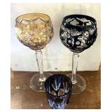 Lovely crystal wine glasses, set of two, believed to be Nachtmann Traube, the amber colored glass has a chipped rim, also includes a small rocks glass, believed to be Nachtmann Traube, see pictures fo
