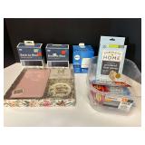 Assorted household items to include a denim die kit, Febreze plug sent booster, powdered vinyl gloves, trinket tray and jewelry binder set, and more. Tub is not included, see pictures for details.