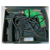 Hitachi electric 3/8 drill with carrying case, powers up, see pictures for details.