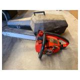 Homelite chainsaw with carrying/storage case, not locked up, see pictures for details.