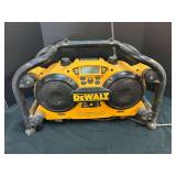 DeWalt DC 011 worksite radio/charger, powers up, see pictures for details.