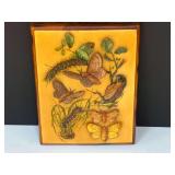 Decorative plaque featuring lappet moths and their caterpillars, see pictures for details.