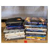 Large assortment of DVDs, see pictures for details.
