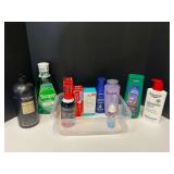 Assorted toiletries to include shampoo, Lysol, mouthwash, toothpaste, and more. Tub is not included, see pictures for details.