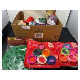 Assorted Christmas ribbon, Christmas themed pie cutter and decorator, and more. See pictures for details.