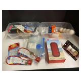 Assorted household items to include Airwick plug-in, Command hangers, waterproof Bluetooth speaker, still new in the box, and more. Tubs are not included, see pictures for details.