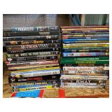 Large assortment of DVDs, see pictures for details.