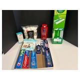 Assorted household items to include a swiffer dry plus wet sweeping kit, body wash, toothpaste, and more. See pictures for details.