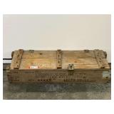 Wooden military ammunition crate. Based on the markings, it was used to store 105mm smoke cartridges for a Howitzer.