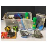 Tub of assorted household hand tools and supplies, includes quick link, chain shackles, dog tie out cable, picture frame assembly kit, measuring tapes, ratcheting PVC pipe cutter, and more, tub is not