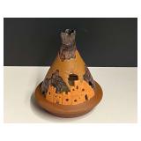 Terra-cotta tea light burner, see pictures for details.