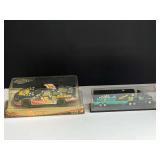 #15 diecast NASCAR replica, 1/24 scale, comes in original box, also includes #32 race team hauler replica, comes with a display case, see pictures for details.