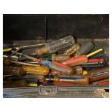 Toolbox with content, mostly screwdrivers, see pictures for details.