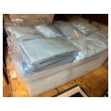 Protective bed pads, tub is not included, approximately 13 packs of five each, see pictures for details.