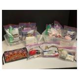 Assortment of giveaway packages, items include hand sanitizer, toothbrush holders, pencils, pens, fidget balls, and more. Tubs are not included, see pictures for details.