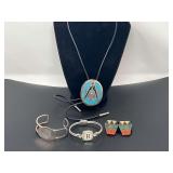 Fashion estate jewelry to include decorative cuff bracelets, Masonic bolo tie, and earrings. See pictures for details.