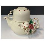 Mud Pie teapot and cup, white ceramic with red polka dot bow and rose, pot, lid and cup, see pictures for details.