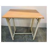 Metal framed table with wood top, top does have wear, see pictures for details.