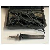 Soldering iron, comes with carrying/storage case and extra tips, see pictures for details.