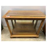 Glass front lighted curio with glass shelf, see pictures for details.