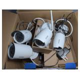 FOUR ZOSI WIRELESS SECURITY CAMERAS