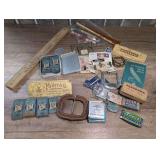 OLD RAZOR BLADES PLUS VINTAGE PENCILS, PENS, FOLDING YARDSTICK, BELT BUCKLES, VINTAGE POSTAL STAMPS, AND MORE, MOST ITEMS WITH ADVERTISING
