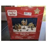 MERRY BRITE 16-PIECE LIGHTED PORCELAIN VILLAGE SET IN ORIGINAL BOX