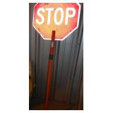 HAND HELD STOP SIGN WITH TRAFFIC CONTROL