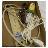 (1) SURGE PROTECTOR, (1) NEW EXT CORD, (2) USED CORDS