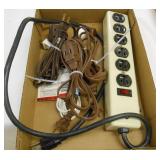 (1) SURGE PROTECTOR, (1) NEW EXT CORD, (3) USED CORDS