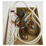 (1) SURGE PROTECTOR, (1) NEW EXT CORD, (3) USED CORDS