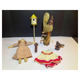 BR3…Assorted rustic household decor, includes a carved wooden chicken, wooden bird figurine, folk art doll, and more. See pictures for details.