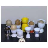 KIT… Large assortment of egg cups, some with faux eggs, see pictures for details.