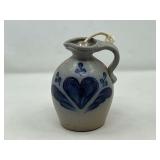 KIT…Rowe pottery stoneware pitcher with stopper, see pictures for details.