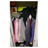 Hallway… Closet lot marked 1540 to include assorted jackets, clothing, and more. See pictures for details.