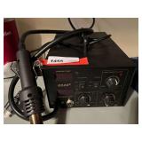 BR1...852D+ SMD Rework Station, a 2-in-1 tool that combines a hot air gun and a soldering iron.