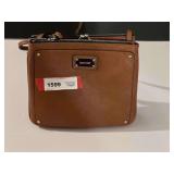 BR4… Ladies handbag marked Nine West, see pictures for details.