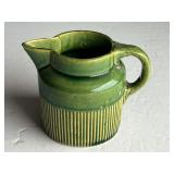 Vintage creamer, believed to be vintage Hull pottery, the handle has been broken and re-glued, see pictures for details. ￼
