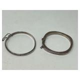 Two silver bangle bracelets, both pieces are stamped 925, see pictures for details.